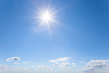 blue cloudy sky with sparkle sun, natural background