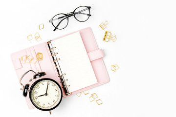 Pink planner with Business Stationery concept. Flat lay, top view