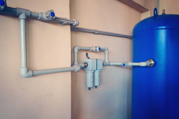 Control air valve, cock, valve, reservoir of air compressor using plastic pipe at the power plant in the enterprise.
