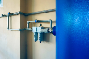 Control air valve, cock, valve, reservoir of air compressor using plastic pipe at the power plant in the enterprise.