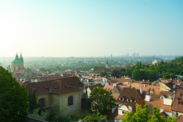 View of the tiled roofs of houses in the center of Prague