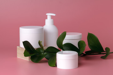 natural facial cream on pink background