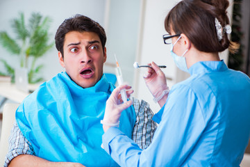 Patient afraid of dentist during doctor visit