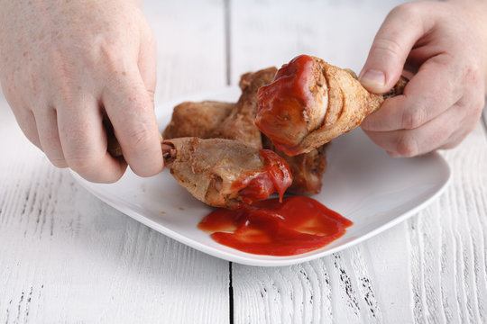 Eat Unhealthy Fry Chicken Leg With Ketchup