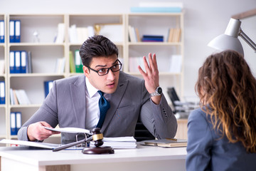Lawyer discussing legal case with client