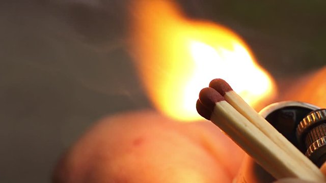 Matches ignited and its flame shot in super slow motion