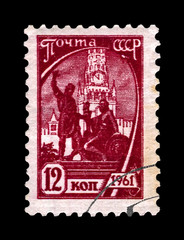 Pozharsky (sitting) and Minin (standing) monument statue (1816-1818), Red Square, Moscow, Russia, circa 1961.canceled vintage postal stamp printed in USSR isolated on black background. 