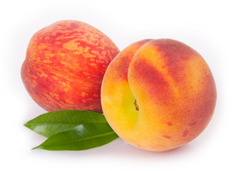 Fresh peaches on white background