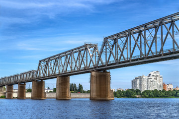 Railway bridge over the river. Perspective view
