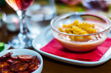 tasty and nutritious tomato soup with fresh pasta, dietary meal