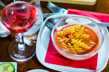 tasty and nutritious tomato soup with fresh pasta, dietary meal