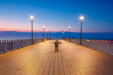 Concrete pier in Kolobrzeg, Poland. Long exposure shot at night