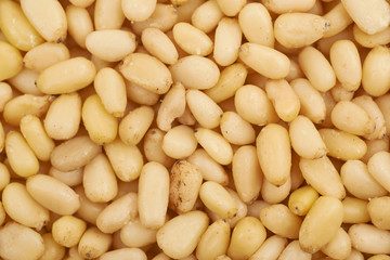 Surface coated with pine nuts