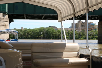 ferry boat with city in background
