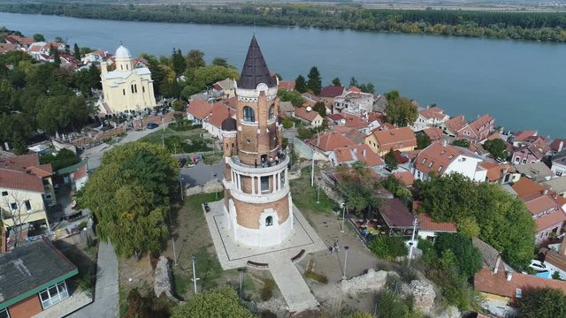 Rotating drone shot of Gardos Tower, a historic landmark structure in the Zemun neighborhood in Belgrade, tourism architecture Serbia