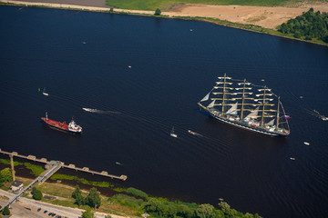 A large sailboat goes along the water area of the Daugava River.
The last windjammer bark...