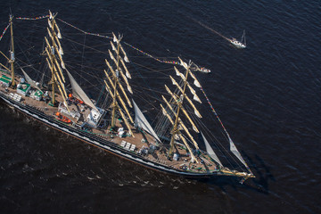 A large sailboat goes along the water area of the Daugava River.
The last windjammer bark...