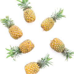 Pineapple fruits on white background. Flat lay, top view. Tropical food concept.