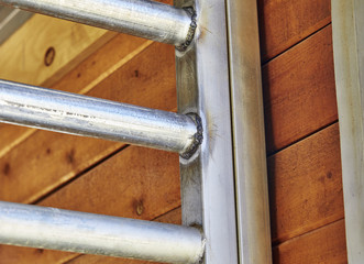 New welds on pipe rails in a barn