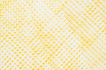yellow crayon pattern on white paper background texture