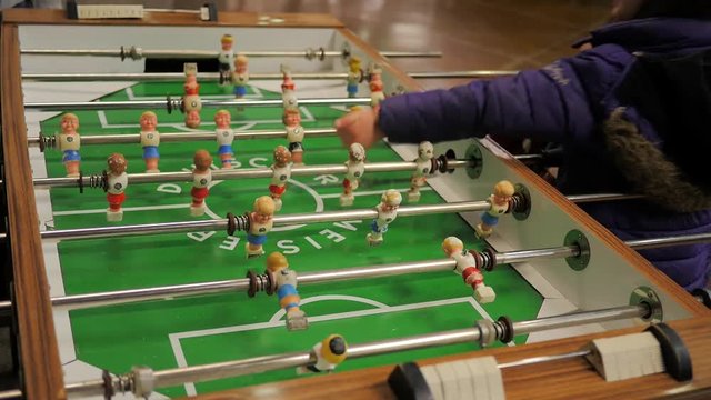 Little Children Playing foosball