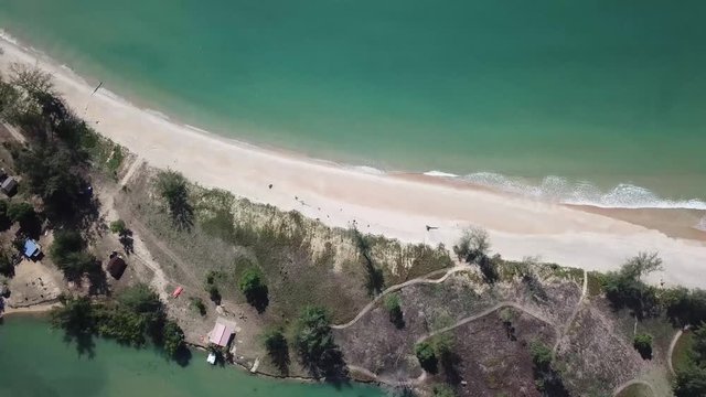 Aerial: Gentlerise shot of a secluded beach, Malaysia