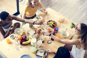 Group of diverse women having breakfast together - obrazy, fototapety, plakaty
