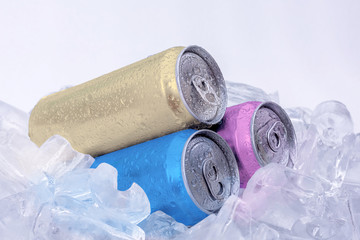 Aluminum beverage drink can in ice isolated on white background..