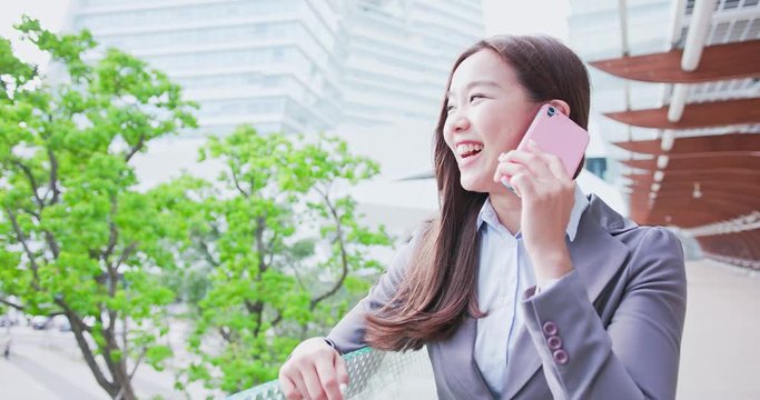business woman speak phone
