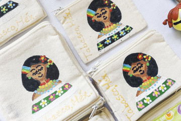 Little bags with doll embroidery. These are Mexican handmade crafts.