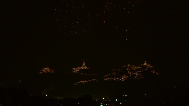 Firework display ,4K video. The most famous firework Pra Nakorn Kiri festival  Thailand displaying over   three pagodas on the hill.