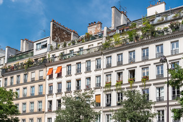 Fototapeta na wymiar Paris, beautiful building in the center, typical parisian facade in the Marais 