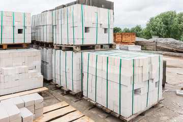 White bricks folded on pallets