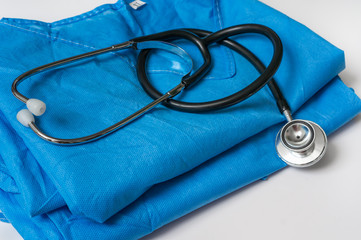 Close-up view of medical stethoscope and doctor uniform