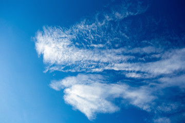 White fluffy clouds in the blue sky