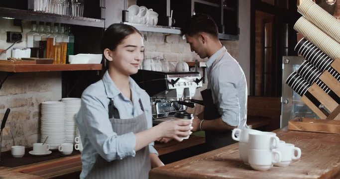 young happy asian couple working in their new cafe. Family business concept 4k