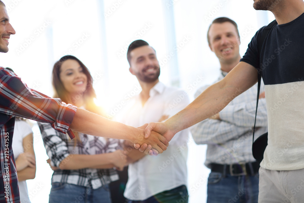 Wall mural closeup of handshake of business partners