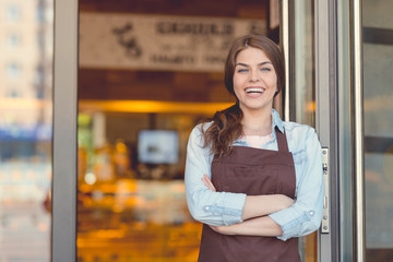 Smiling woman in the bakery
