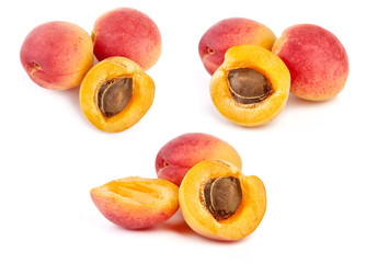 Isolated apricots. Fresh apricot fruit isolated on white background. Tropical abstract background. Fresh fruits. Place for your text.