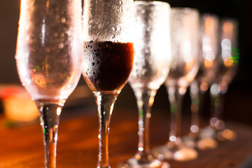Glasses with wine on dark background. alcohol concept