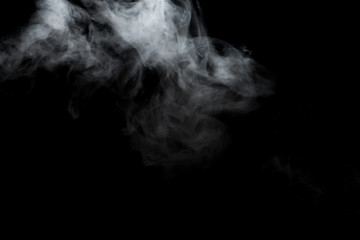 White smoke isolated on black background.