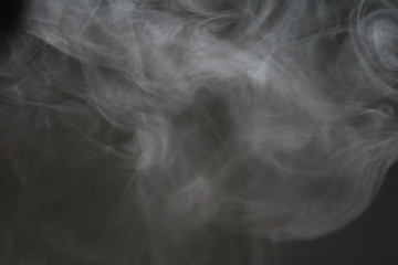 White smoke isolated on black background.