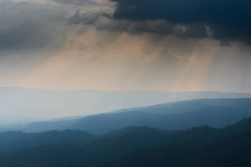 The layer of mountain with the fog and soft light