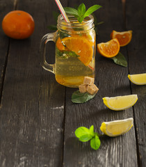 Refreshing summer cocktail with crushed ice and citrus fruits