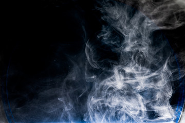 White smoke isolated on black background.