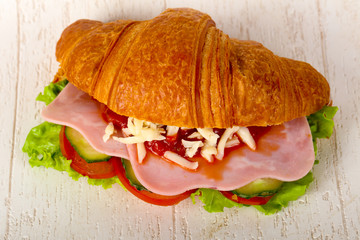 Croissat with ham and cheese