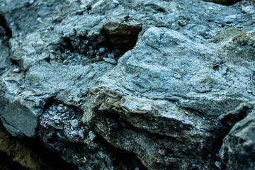 Broken concrete stone, white stone background on the street