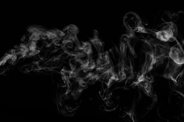 White smoke isolated on black background.