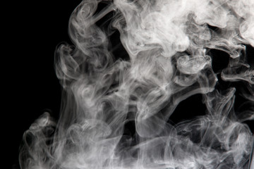 White smoke isolated on black background.