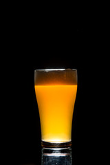 craft beer glass on black background